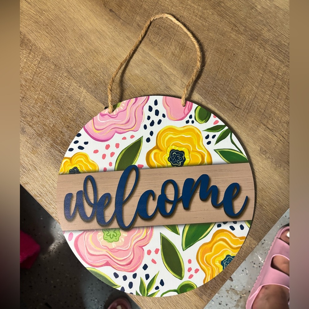 Small Floral Welcome Sign with Blue Lettering